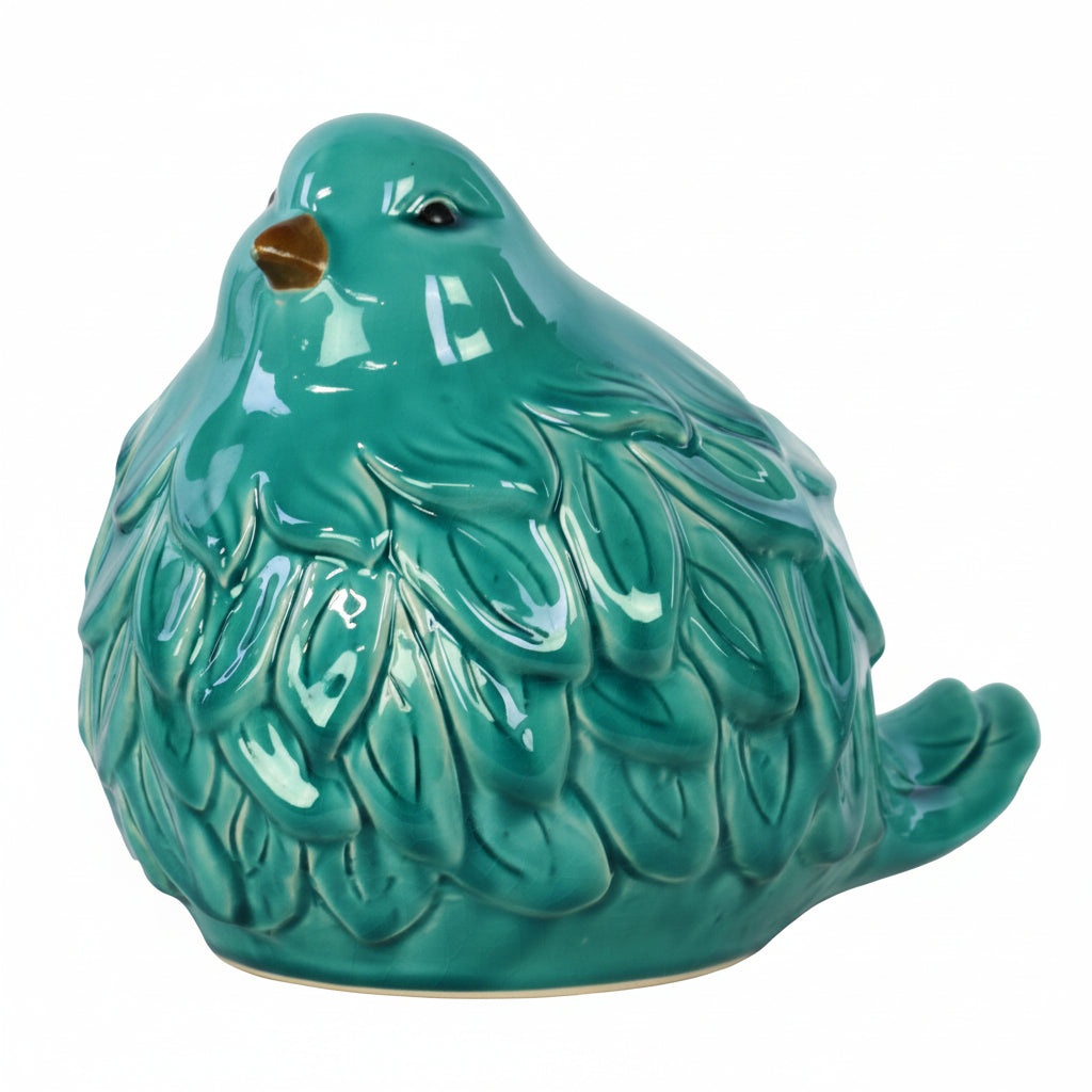 A glossy teal porcelain bird figurine with a matte beak and feet.