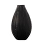 Ceramic vase with a round bellied shape and an engraved abstract design, finished in gloss white.