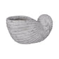 A gray polyresin planter designed to resemble a shell.