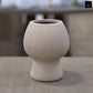 Zoryana Sculpted Stoneware Pot with Pedestal Base