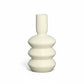 A white ceramic vase with a gloss finish and an abstract, twisty shape, approximately 14.50 inches in height.