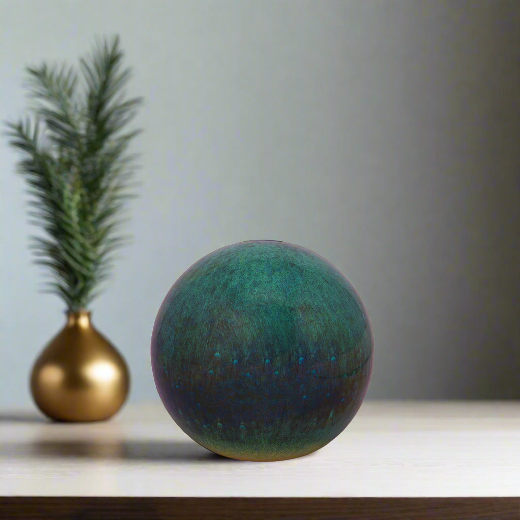 Spherical object with a textured surface on a white background