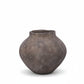 A textured gray ceramic pot with a rounded bulbous shape and a small flared rim, shown against a plain white background.