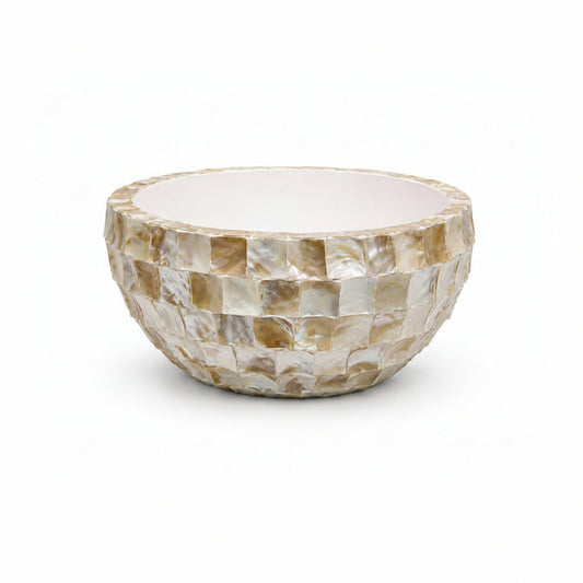 Decorative bowl with shell pattern on a white background