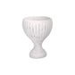 A white textured ceramic planter pot with a ribbed vertical pattern and a flared base, shown against a plain white background.