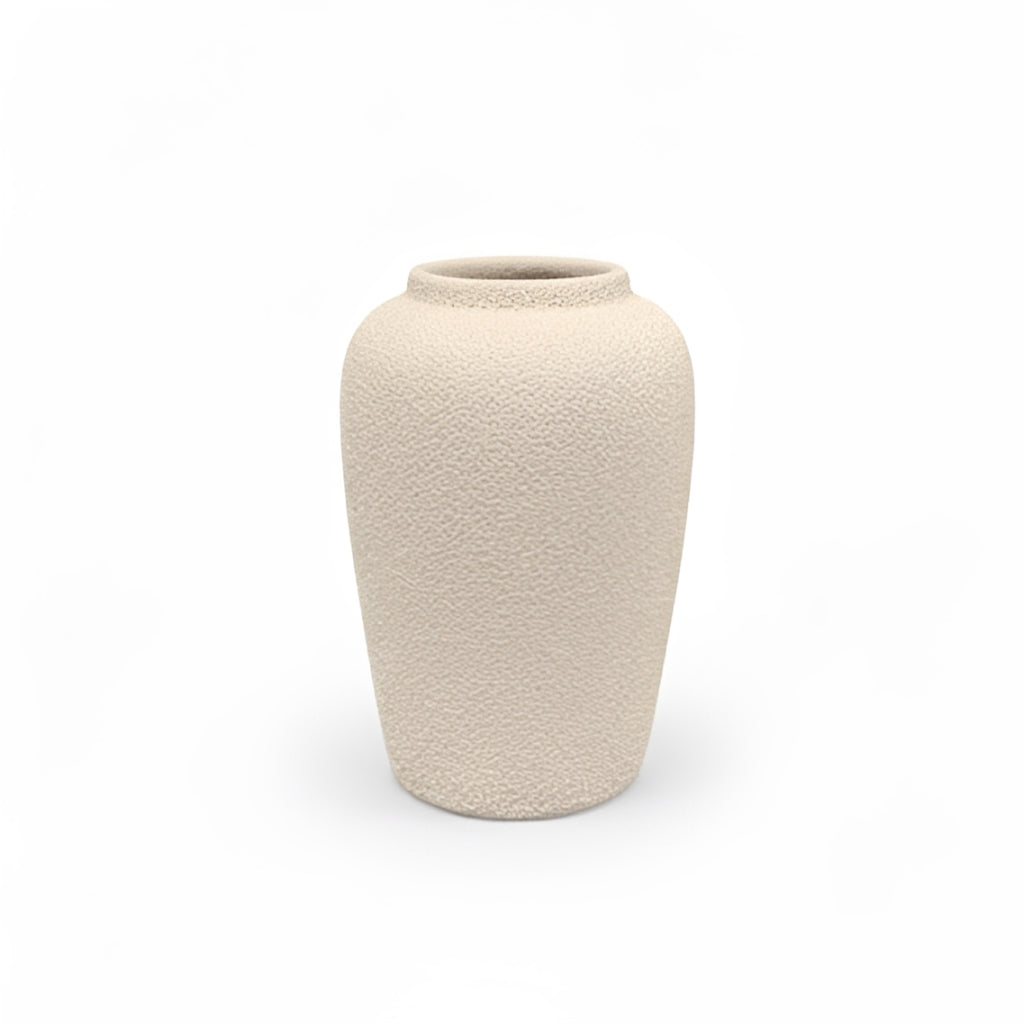 A small textured ceramic vase in a warm cream or off-white color, shown on a clean white background.