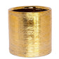 A cylindrical gold ring with a textured, brushed metallic finish, shown against a plain white background.