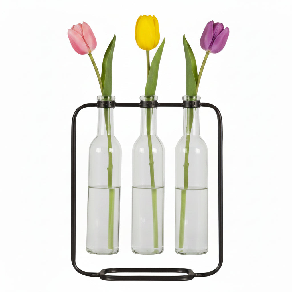 Black metal bottle holder with three clear bottles on a white background