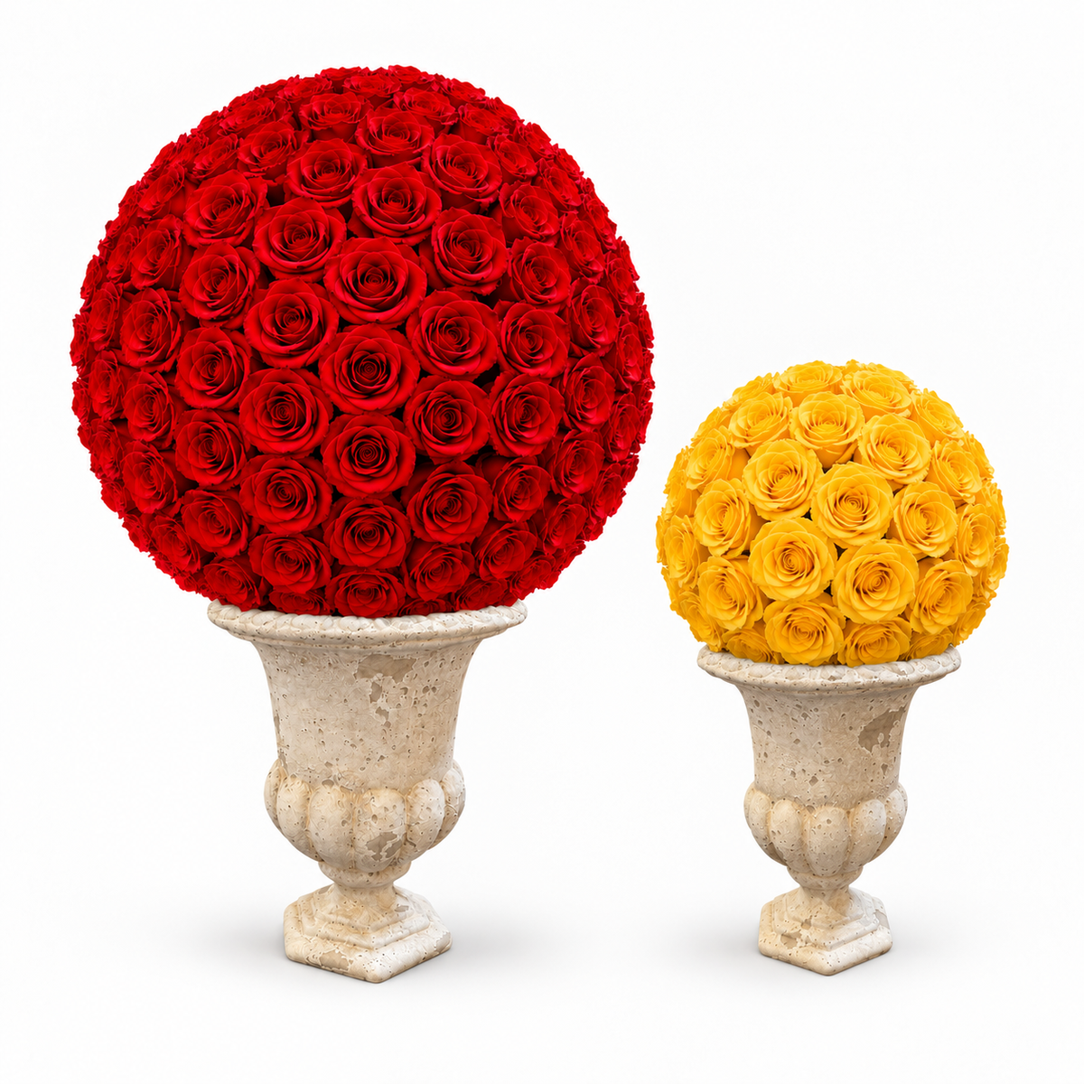 Two decorative floral topiary spheres on stone-style pedestals, one large red rose ball and one smaller yellow rose ball, photographed on a clean white background.